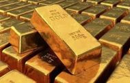 الذهب يهبط مع صعود الدولار لأعلى مستوى في أسبوعين